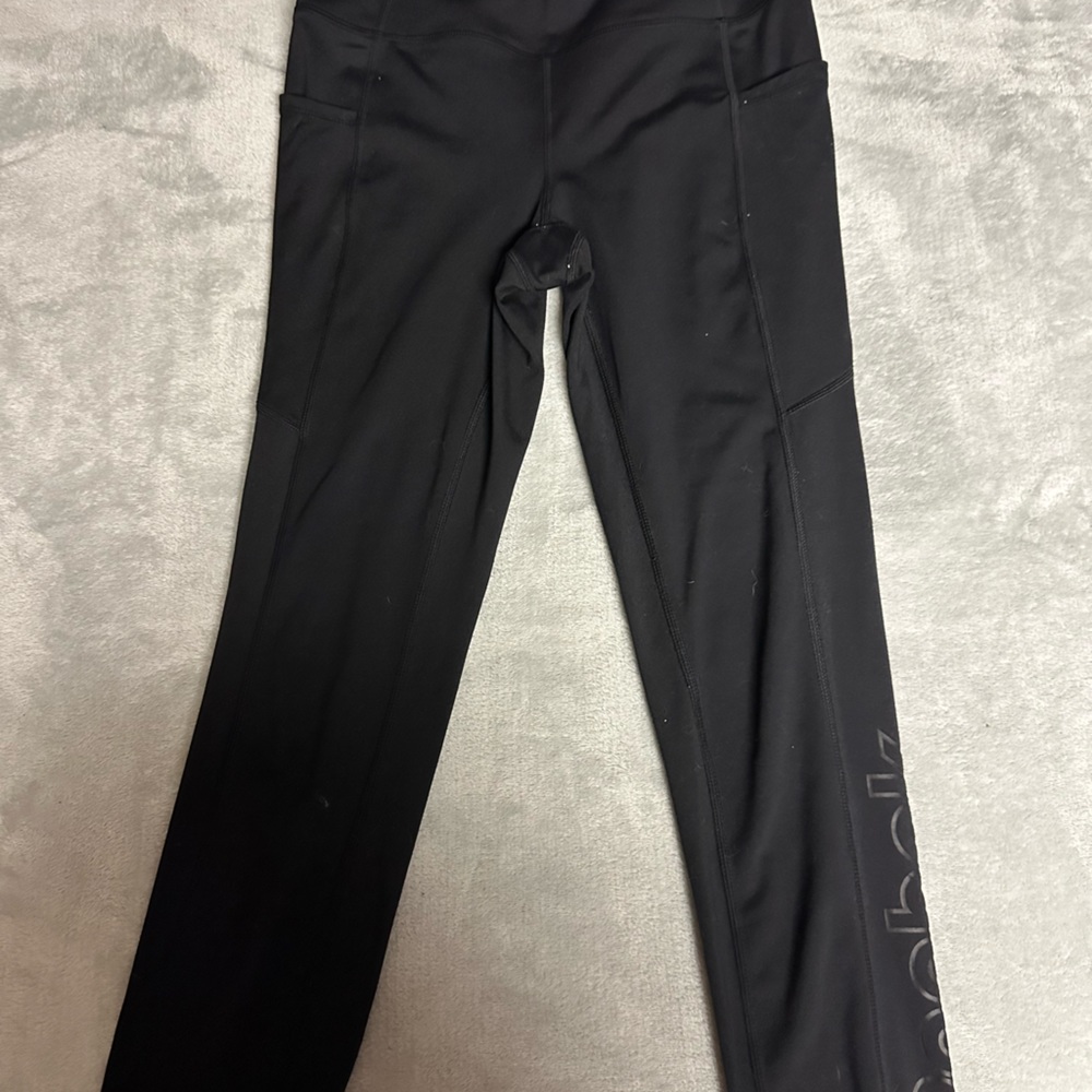 I have reebok leggings, worn once, the white was just fuzz.
